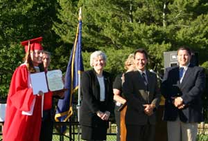 Megan Displays her Diploma