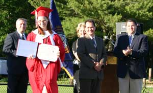 Katrina shows everyone her diploma!