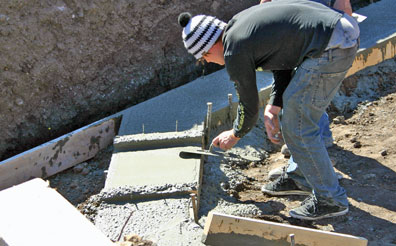 Smoothing the concrete footing